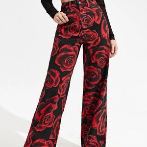 High waist black jeans with red rose print.